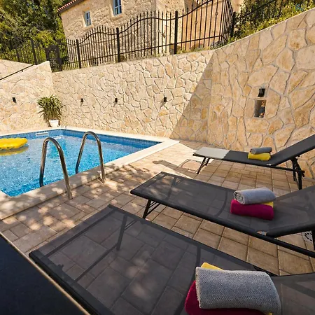 Adria Stone House *